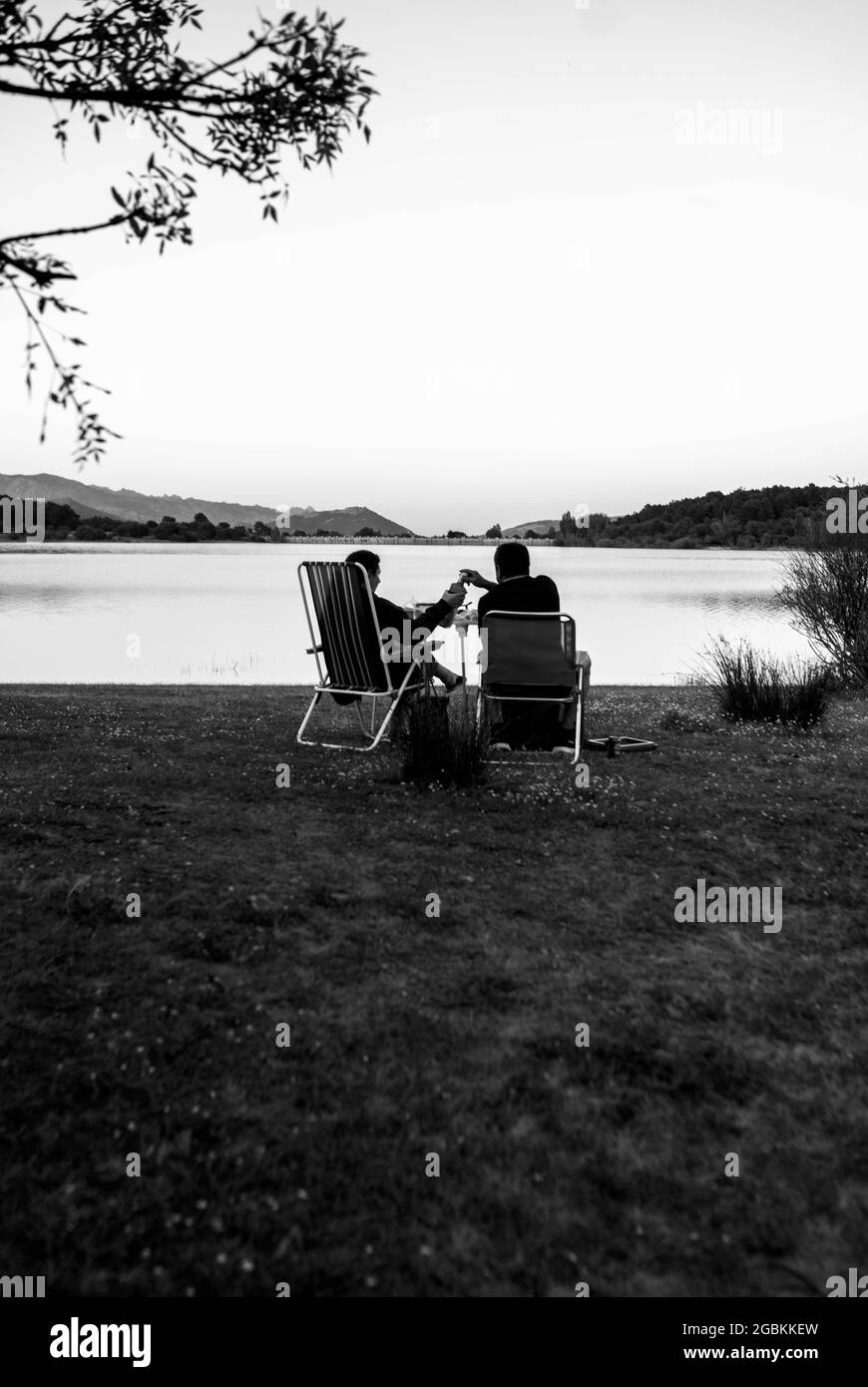 Chairs sitting by the lake Black and White Stock Photos & Images - Alamy