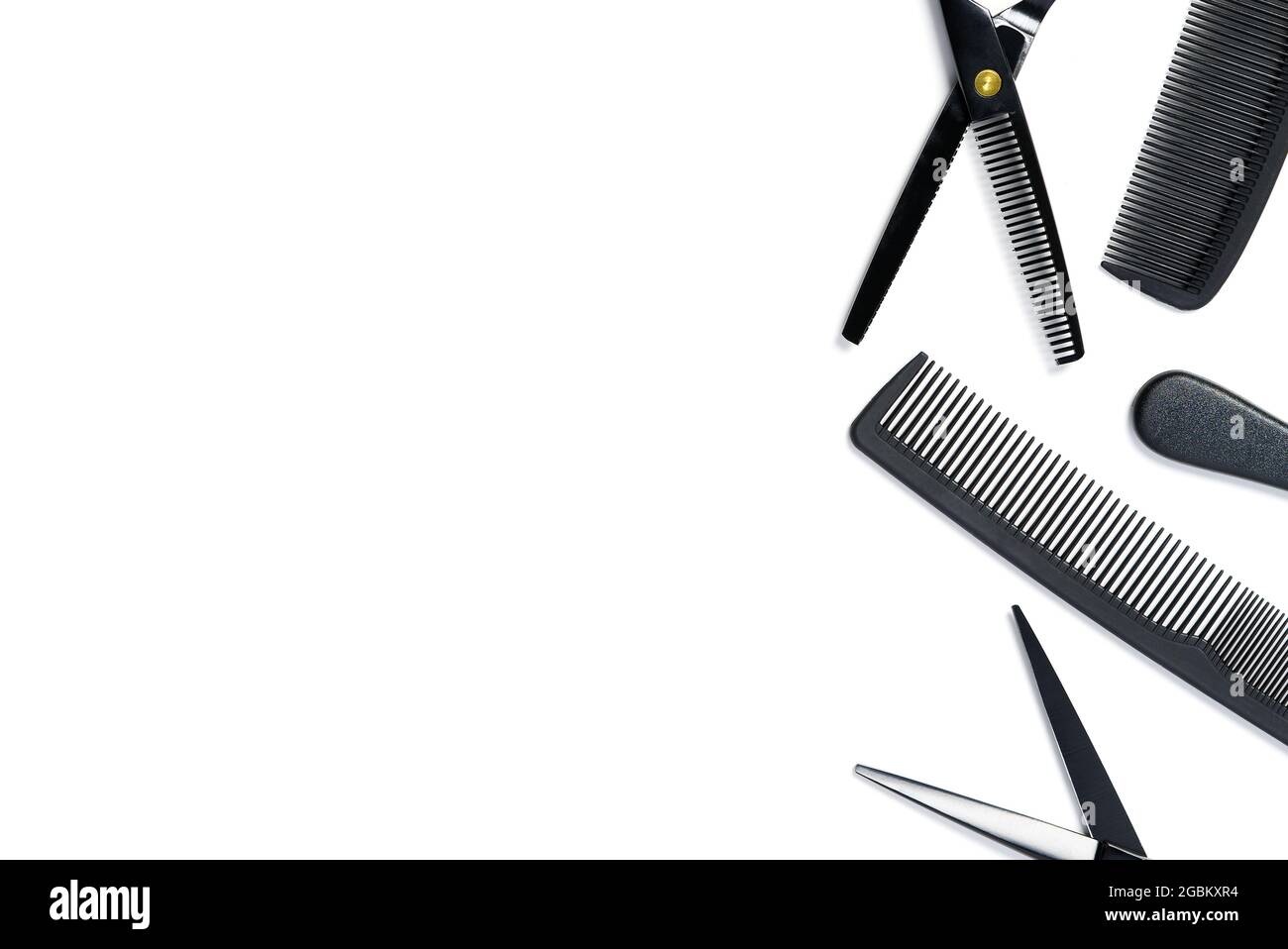 layout on white from scissors and combs for hairdressing services Stock Photo