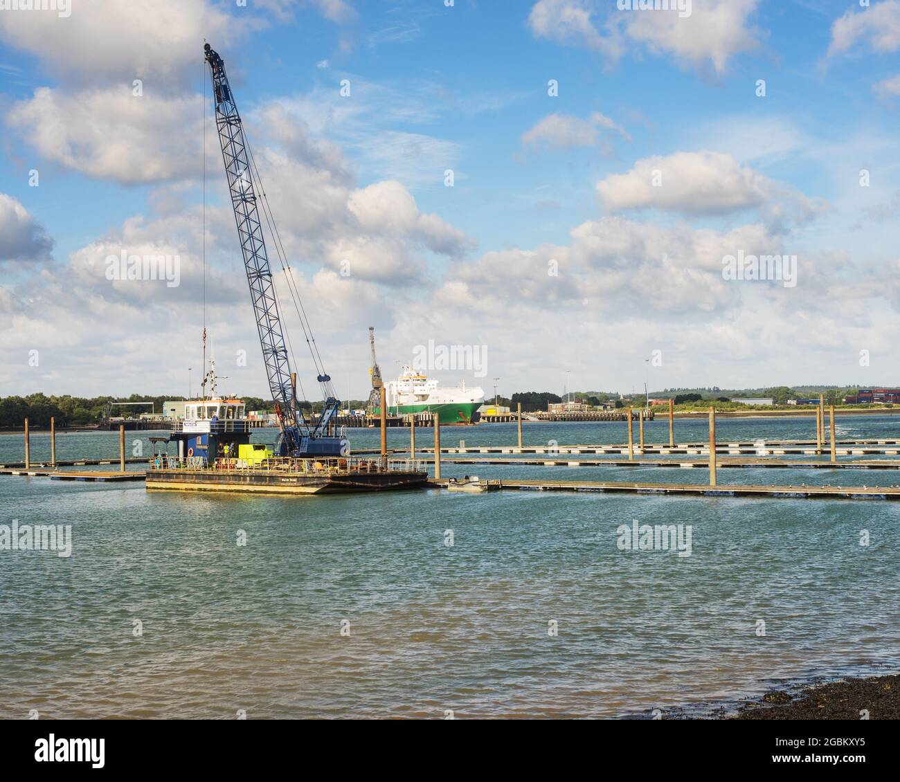 Walcon Wizard, a self-propelled piling barge, setting up pontoons in Southampton Water off Mayflower Park in preparation the 2021 Southampton Boat Sho Stock Photo