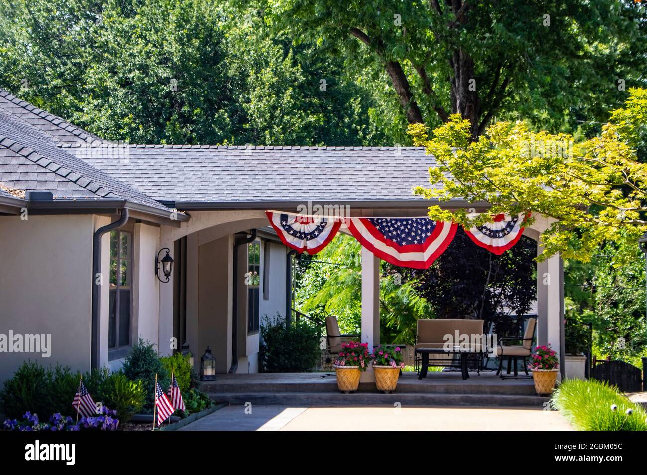 Outside covered patio with furniture and patriotic Forth of July