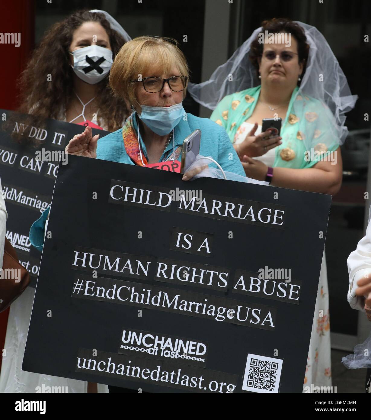 New York, New York, USA. 4th Aug, 2021. Activists protest against 'Child Marriage' laws which don't protest young girls, held outside Governor Cuomo's NYC office at 633 Third Avenue. (Credit Image: © Nancy Kaszerman/ZUMA Press Wire) Stock Photo