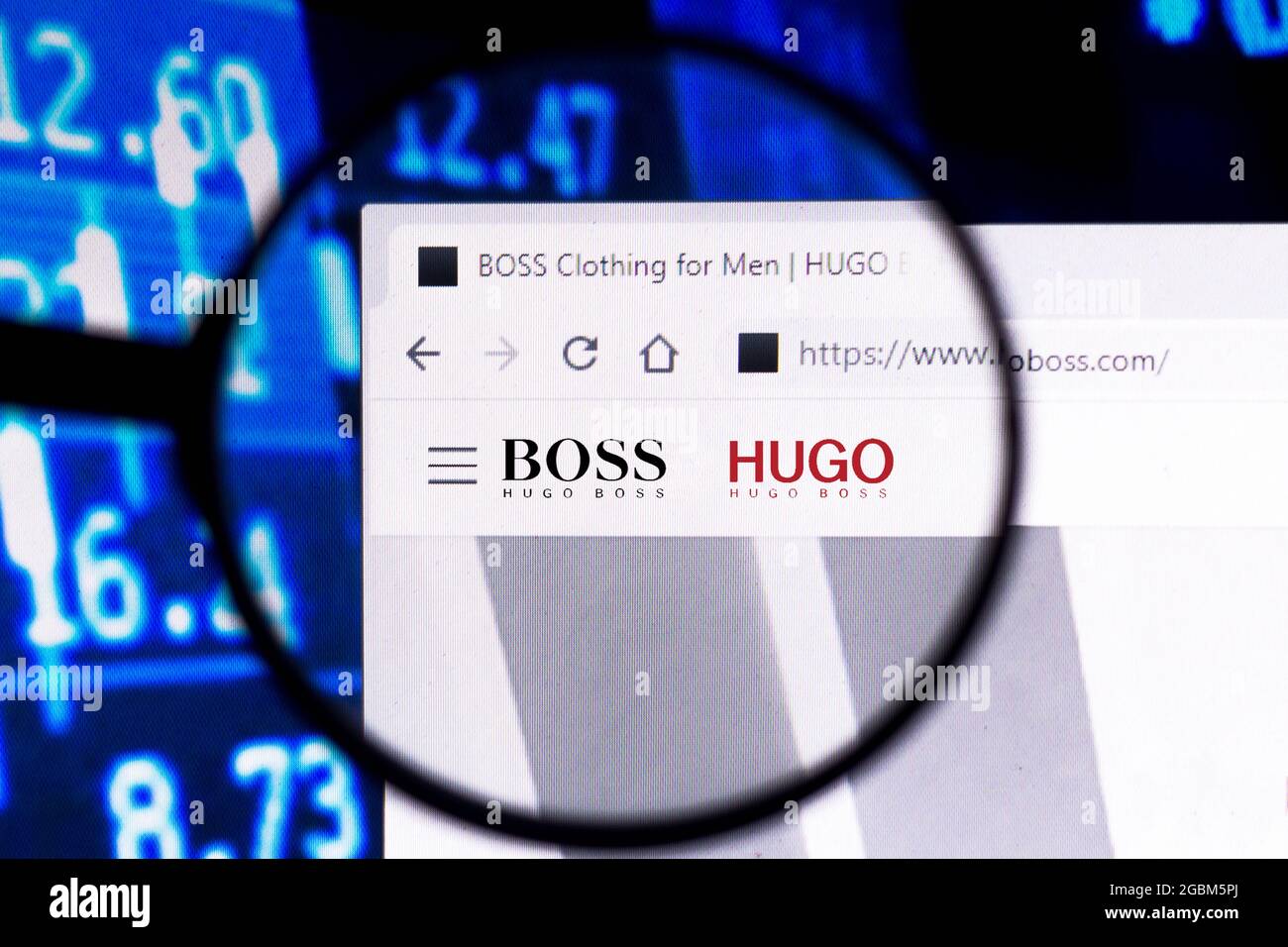 In this photo illustration, the homepage of the Hugo Boss website on a computer screen through a magnifying glass. (Photo by Rafael Henrique / SOPA Images/Sipa USA Stock Photo - Alamy