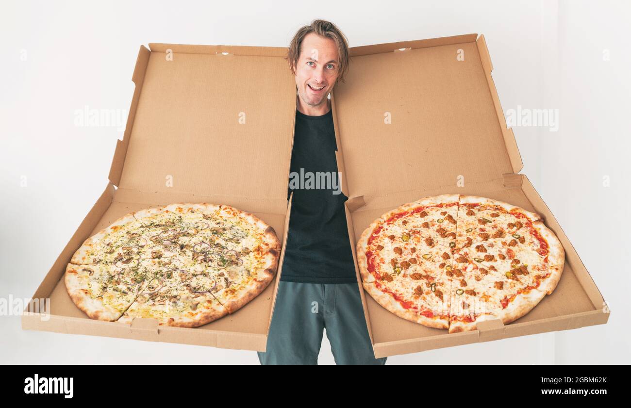 New York style pizzas takeout. Delivery man showing funny oversized