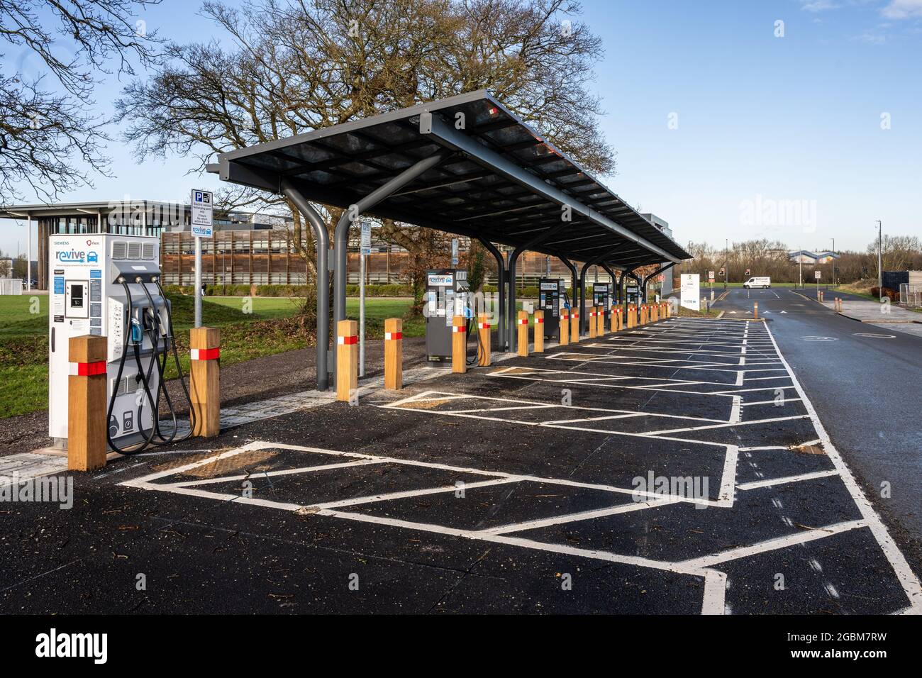 A newly constructed electric car fast charging station stands empty at