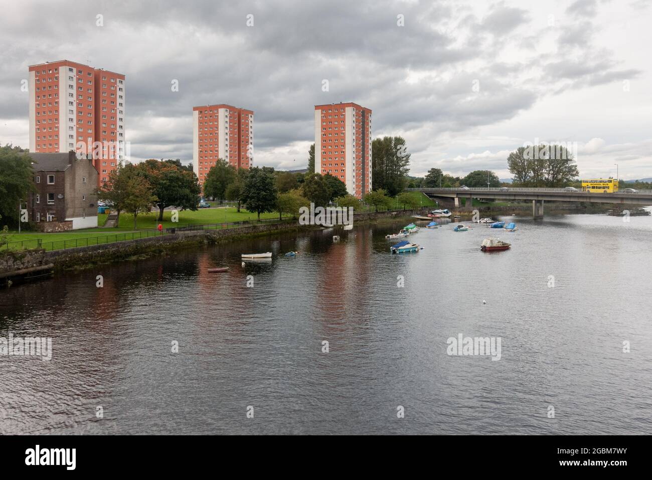 High rise tower blocks rise from the banks of the River Leven on the West Bridgend council estate in Dumbarton, Scotland. Stock Photo