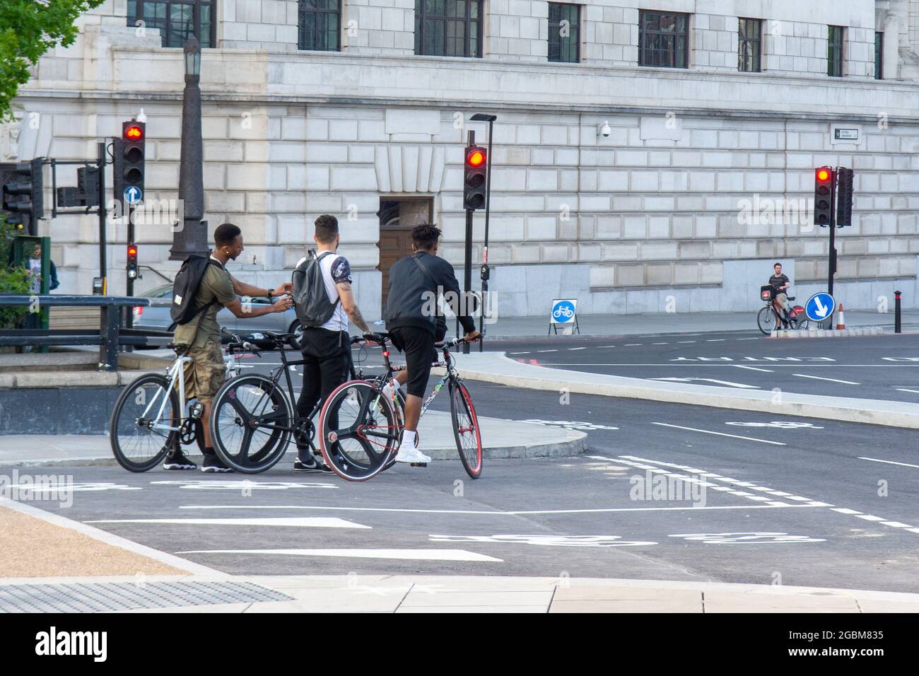 Cyclists ride through central London on the newly opened 'Cycle Superhighway' at Blackfriars Bridge. Stock Photo