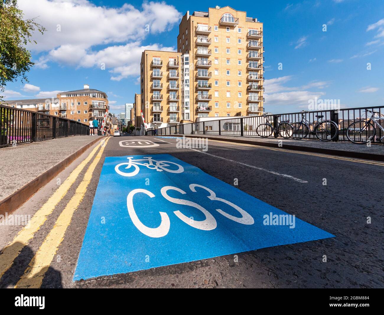 London, England, UK - June 20, 2010: A sign for the new "Cycle Superhighway 3" cycle route is painted on the carriageway of Narrow Street in Limehouse Stock Photo