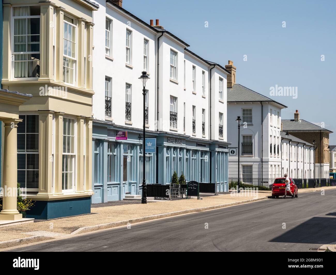 New build town houses and mixed use apartment buildings including shops
