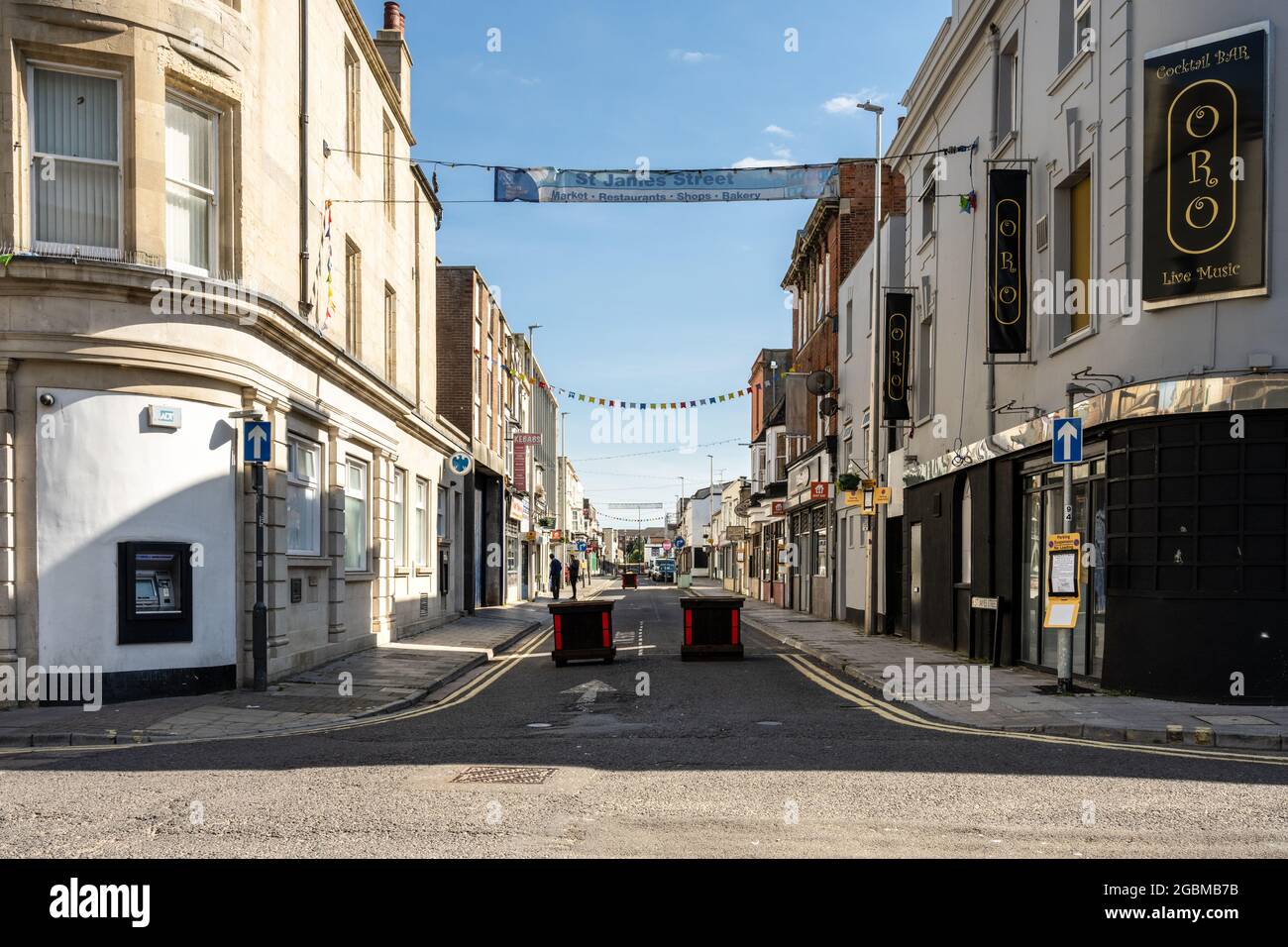 A temporary 'modal filter' uses planter boxes to pedestrianise a shopping street in Weston-super-Mare during the Covid-19 pandemic. Stock Photo