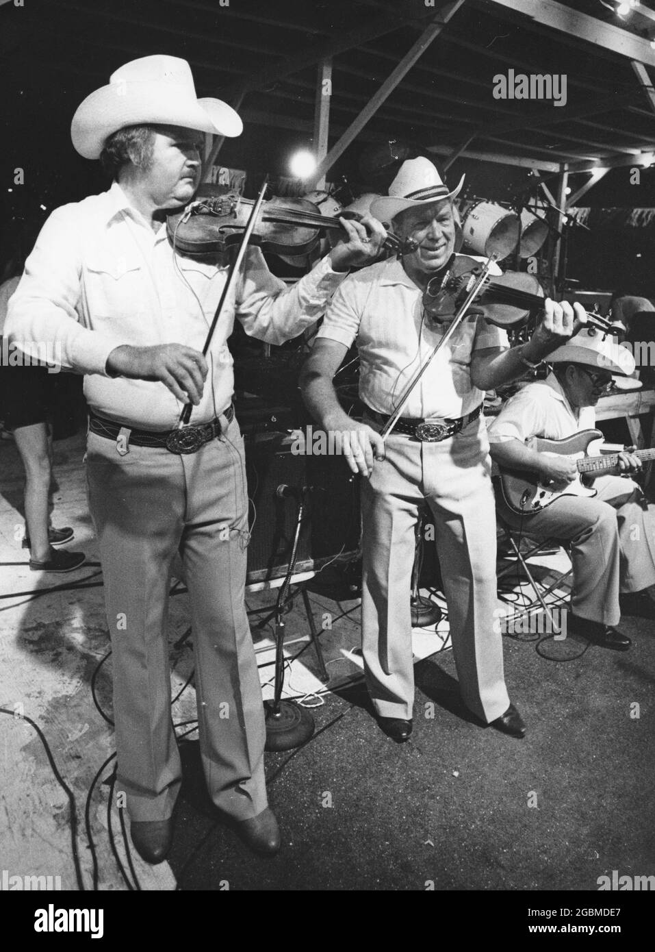 Austin Texas USA, circa 1980: Bob Wills' Original Texas Playboys performing a show at an outdoor venue. ©Bob Daemmrich Stock Photo