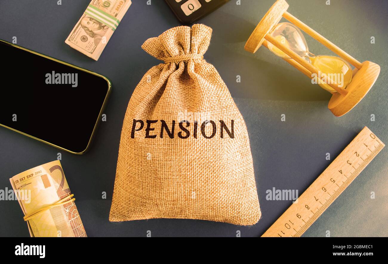 A bag with money and the word Pension. Pension payments. Help from the state. Accumulation and saving money. Accumulation of pension contributions, en Stock Photo