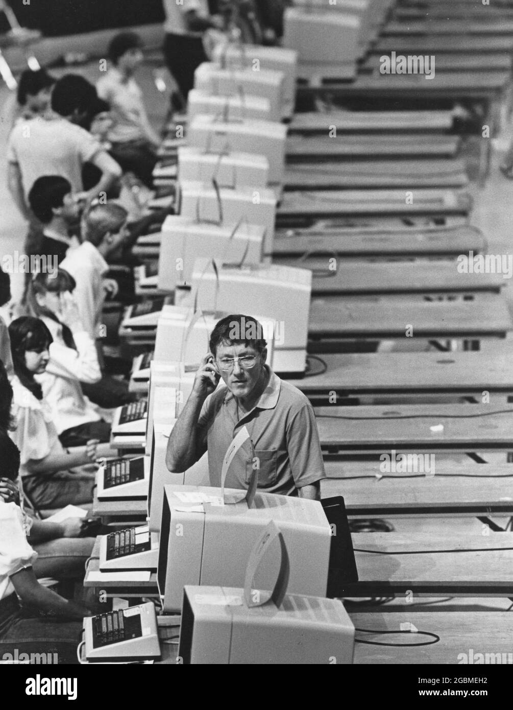 Austin, Texas USA, circa 1989: University of Texas students use computers to register for classes at the beginning of the semester. ©Bob Daemmrich Stock Photo