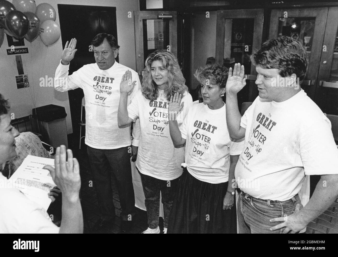 Austin Texas USA, circa 1992 Deputy voter registrars being sworn into