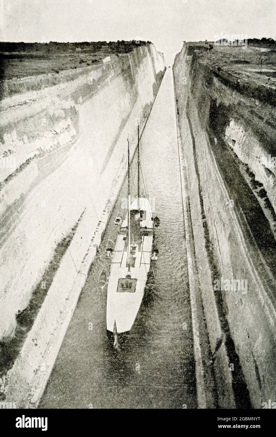 The 1912 caption reads: “Canal that Nero Dreamed of - This is one of the wonderful canals which helped to shorten the journey around the world. It is the Corinth Canal, cut through the Isthmus of Corinth, and it enables ships to go to Athens and then on through the blue Aegean Sea to Constantinople without having to sail round the rocky coast of Morea, in the south of Greece. When the Roman emperor Nero was young and energetic, he caused this canal to be be begun, but the work was put off and never resumed until our own time. It is 3.2 miles long, and was cut through limestone rock in one part Stock Photo
