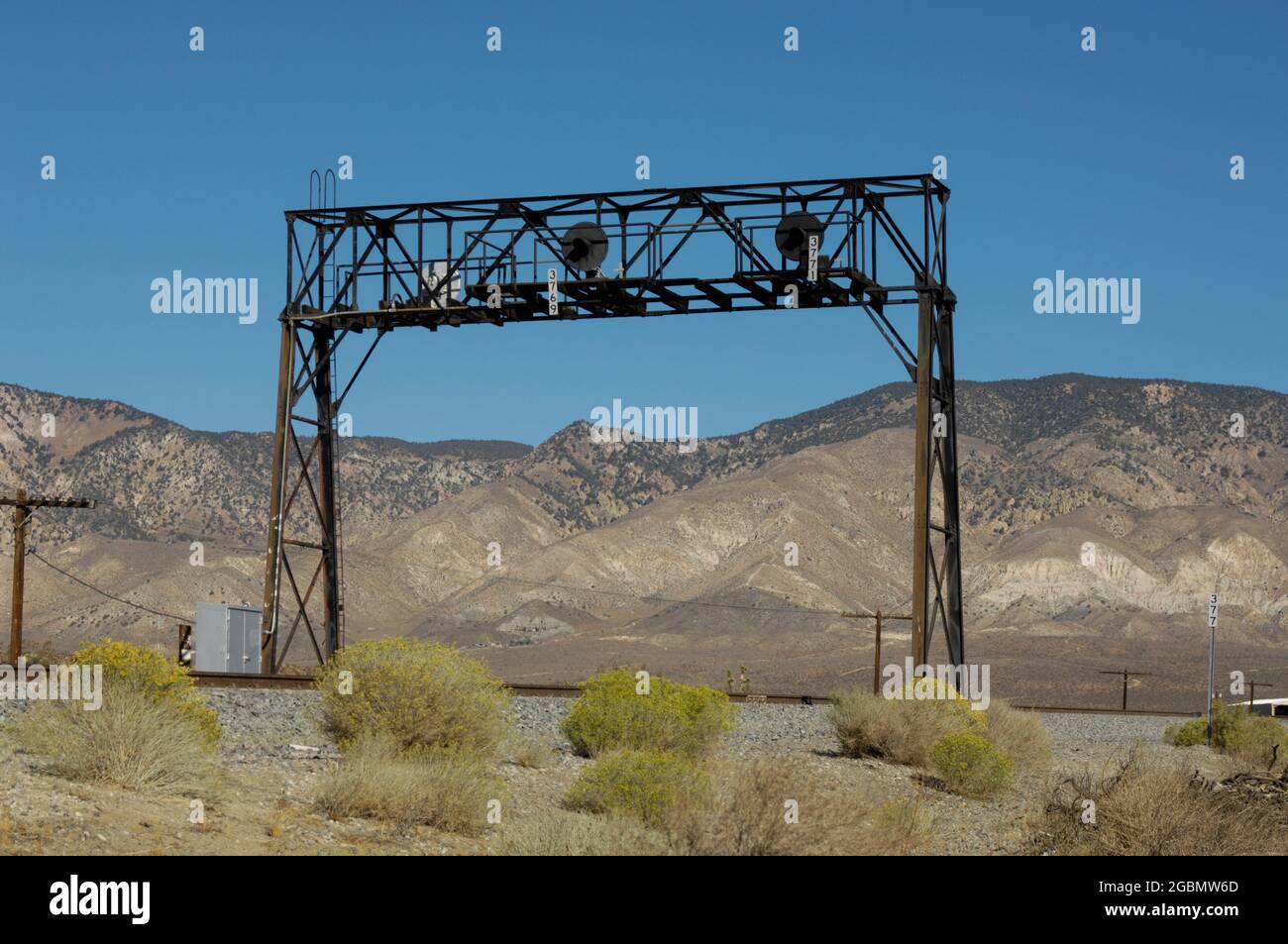 Railroad signal bridge near Mojave, California Stock Photo