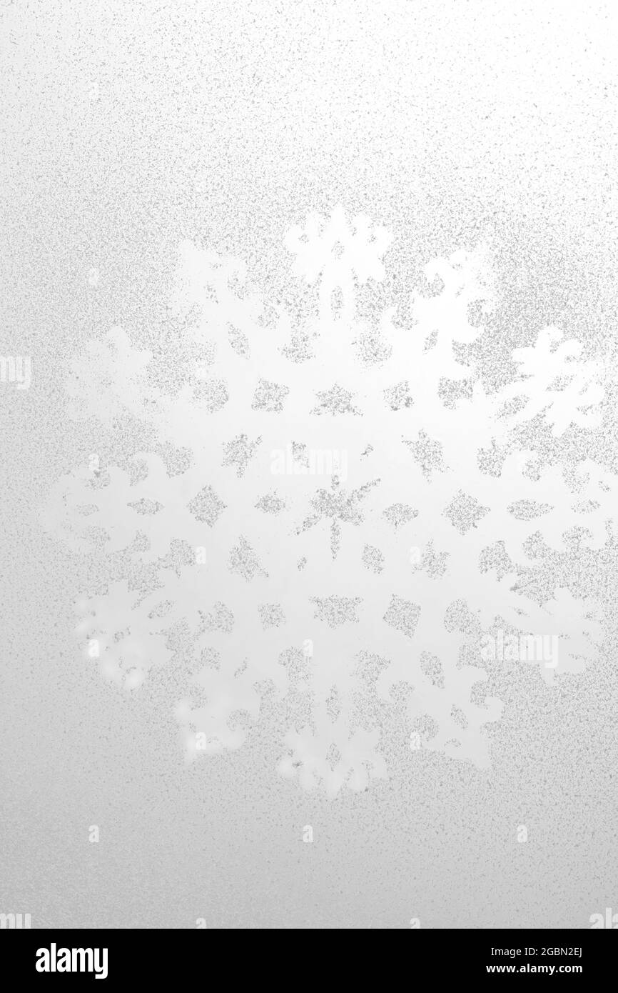 Snowflake pattern on window Stock Photo - Alamy