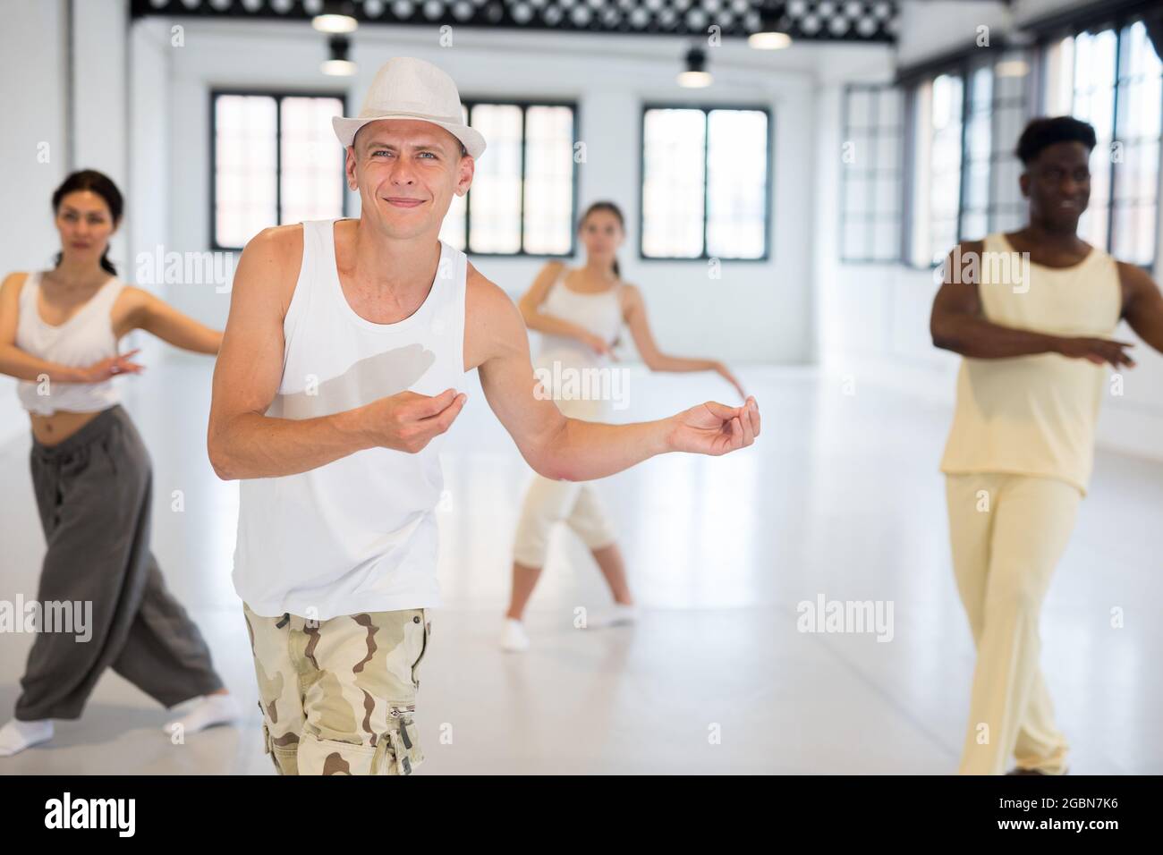 Dancers training swing movements Stock Photo