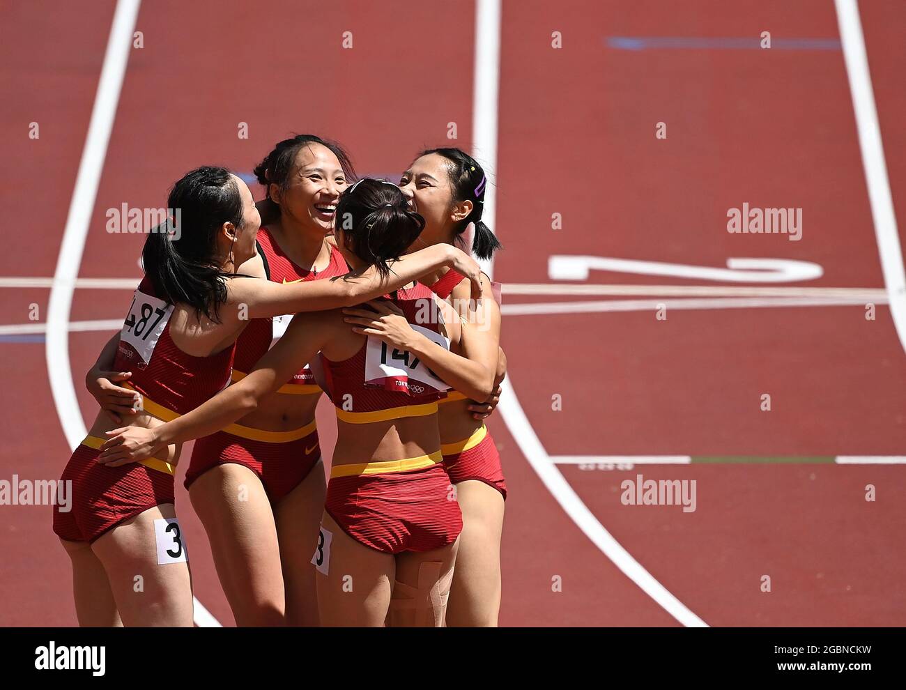 Tokyo, Japan. 5th Aug, 2021. Team China react during the women's 4x100m relay heats at Tokyo 2020 Olympic Games, in Tokyo, Japan, Aug. 5, 2021. Credit: Li Yibo/Xinhua/Alamy Live News Stock Photo