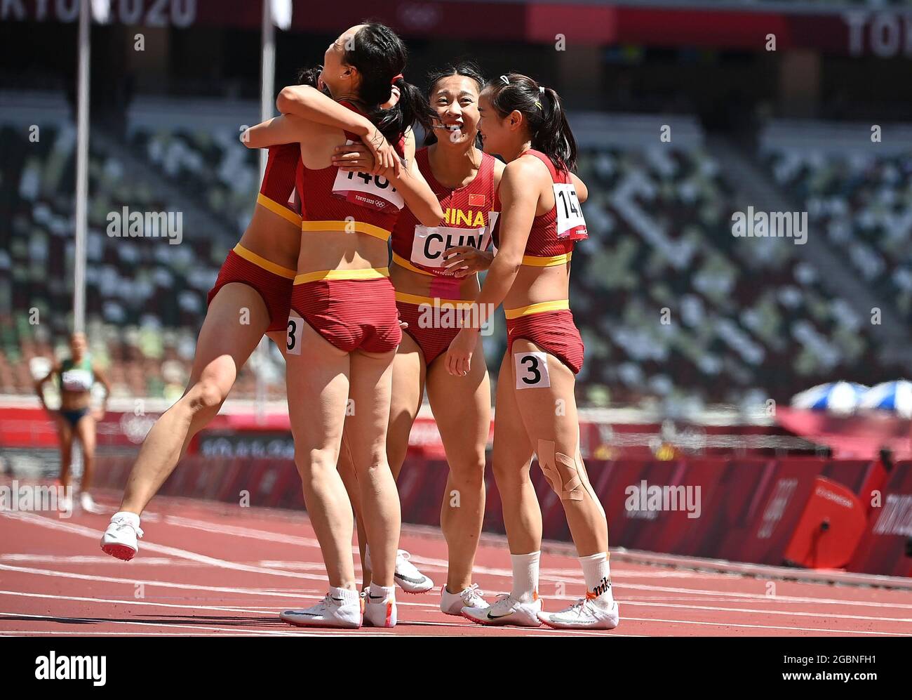 Tokyo, Japan. 5th Aug, 2021. Team China reacts during the women's 4x100m relay heats at Tokyo 2020 Olympic Games, in Tokyo, Japan, Aug. 5, 2021. Credit: Jia Yuchen/Xinhua/Alamy Live News Stock Photo