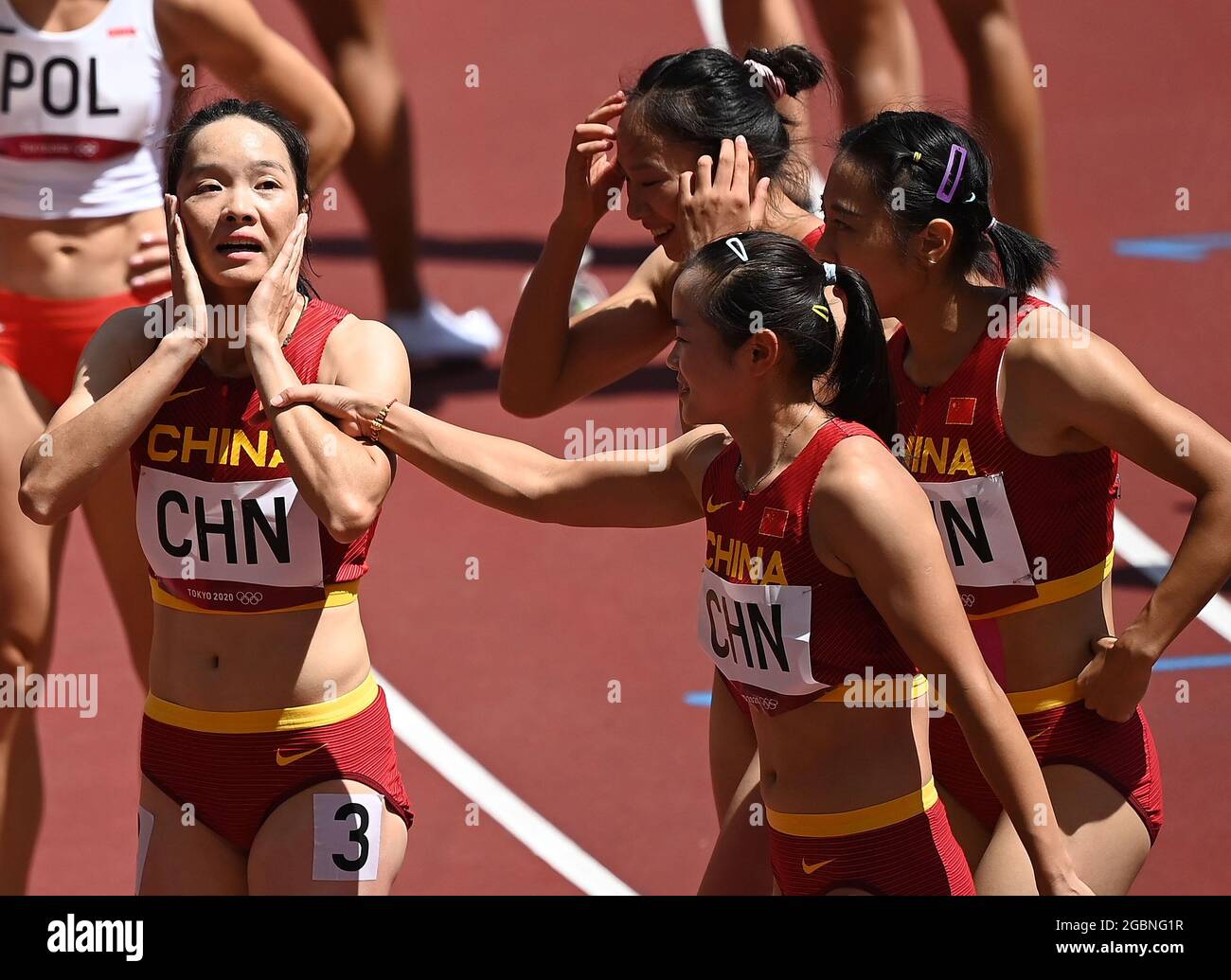 Tokyo, Japan. 5th Aug, 2021. Team China react after the women's 4x100m relay heats at Tokyo 2020 Olympic Games, in Tokyo, Japan, Aug. 5, 2021. Credit: Li Yibo/Xinhua/Alamy Live News Stock Photo