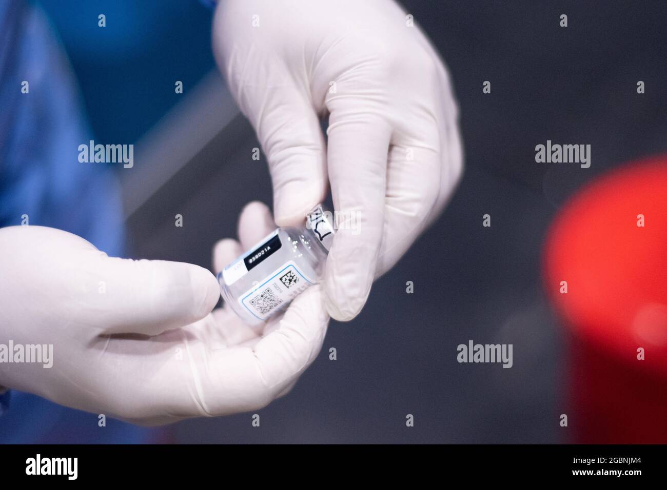 A nurse shows the vial the Moderna COVID-19 Vaccine as people from ages 25 to 30 start their vaccination phase with the Moderna novel COVID-19 vaccine against the Coronavirus disease in Bogota, Colombia on August 3, 2021. Stock Photo