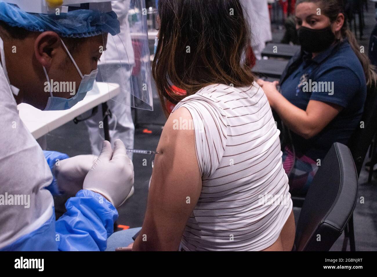 People from ages 25 to 30 start their vaccination phase with the Moderna novel COVID-19 vaccine against the Coronavirus disease in Bogota, Colombia on August 3, 2021. Stock Photo