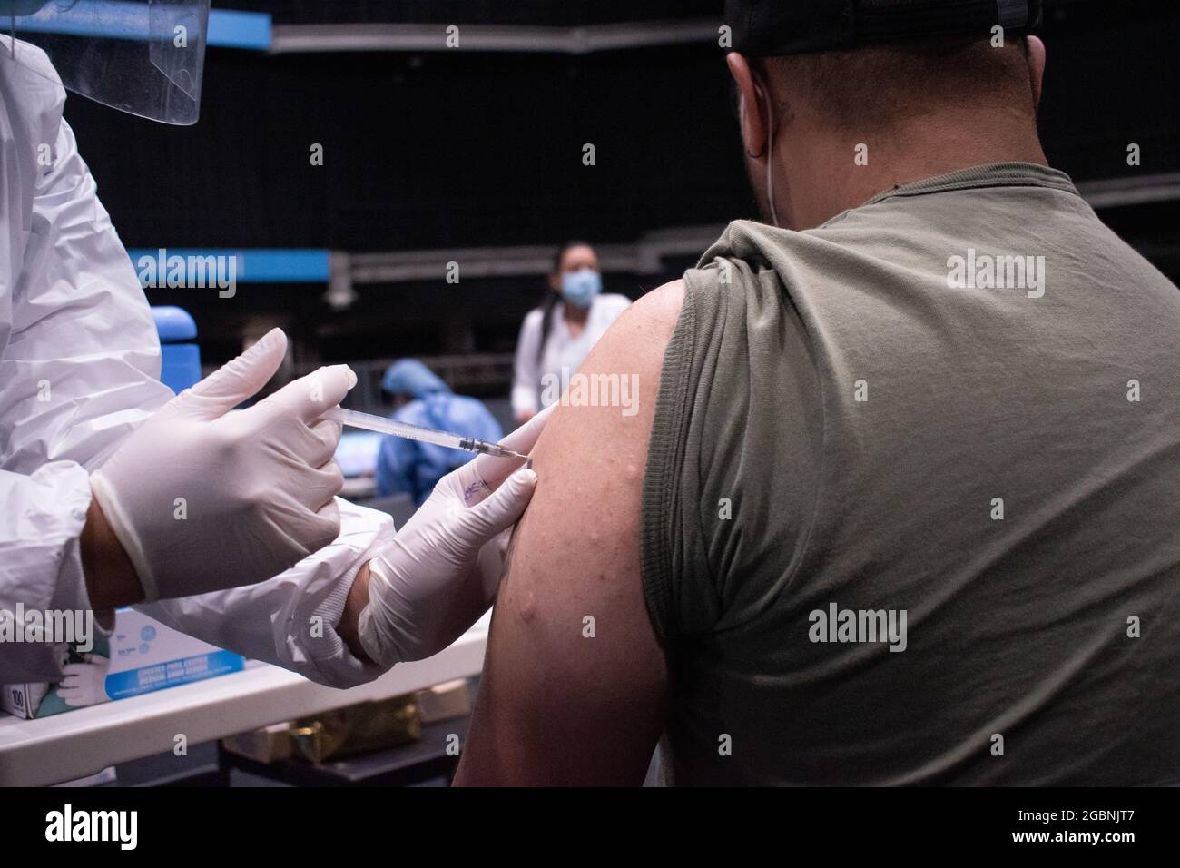 People from ages 25 to 30 start their vaccination phase with the Moderna novel COVID-19 vaccine against the Coronavirus disease in Bogota, Colombia on August 3, 2021. Stock Photo