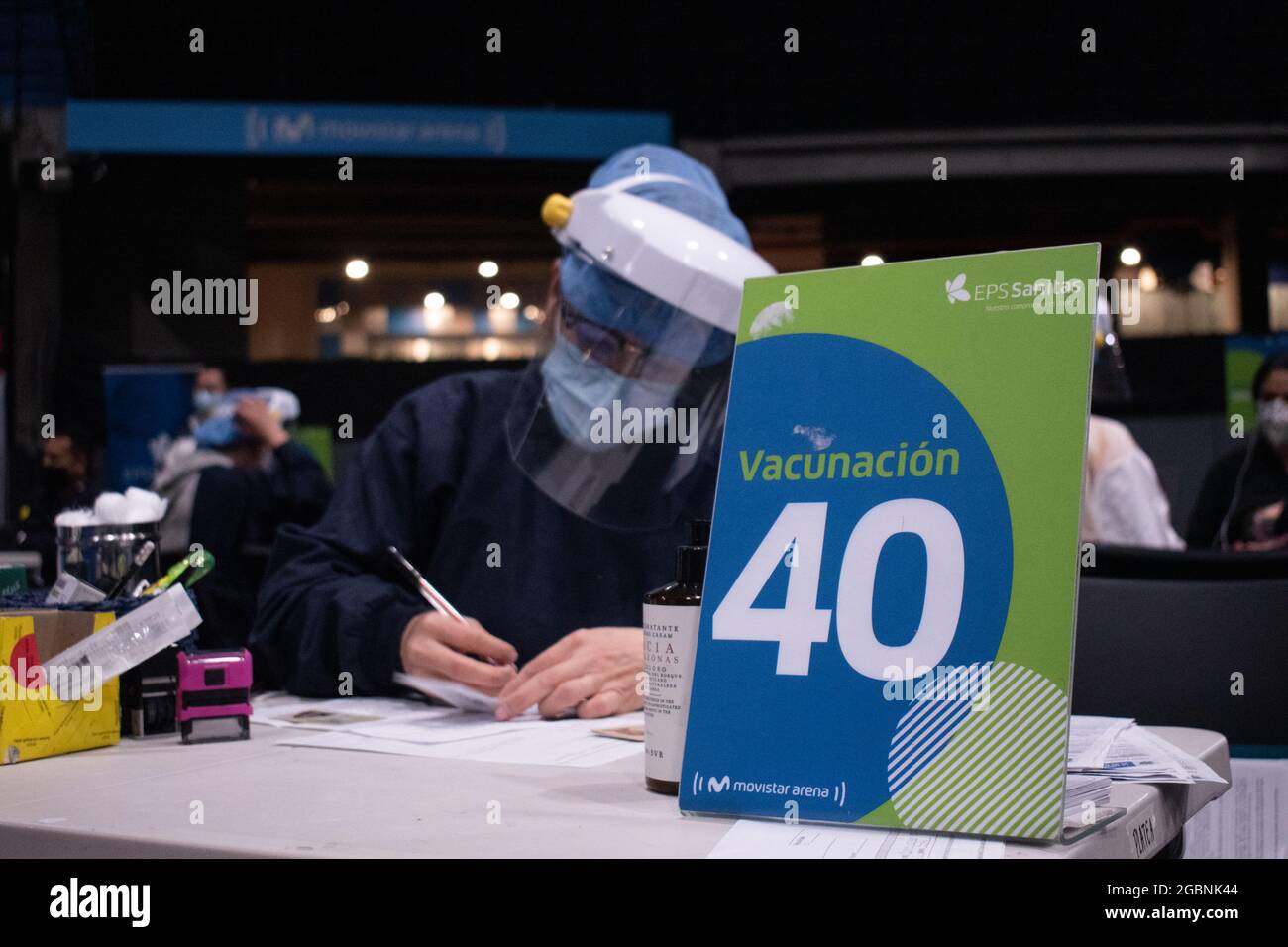 A nurse fills out the Moderna COVID-19 Vaccine consent as people from ages 25 to 30 start their vaccination phase with the Moderna novel COVID-19 vaccine against the Coronavirus disease in Bogota, Colombia on August 3, 2021. Stock Photo