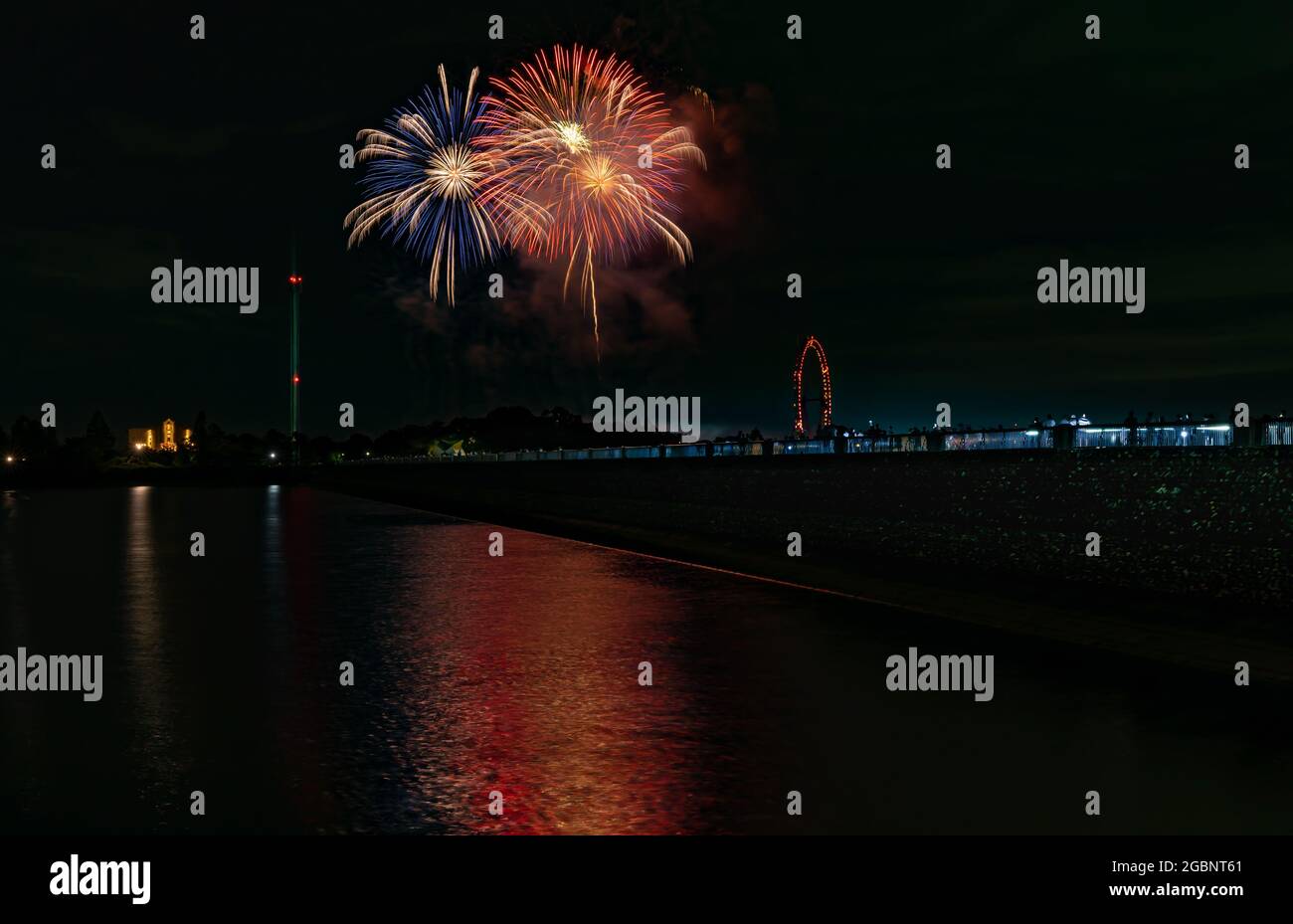 Beautiful Fireworks Celebration In Japan | Summer Season Night Festival | Near The Lake | No People  | Firework With Colourful Shadow Stock Photo