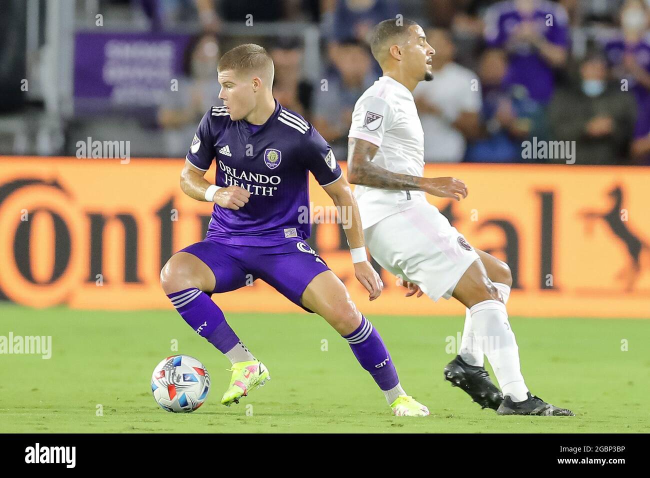 August 4, 2021: Orlando City forward CHRIS MUELLER (9) competes for the ball against Inter Miami midfielder GREGORE (26) during the MLS Orlando City vs Inter Miami soccer match at Exploria Stadium in Orlando, Fl on August 4, 2021. (Credit Image: © Cory Knowlton/ZUMA Press Wire) Stock Photo