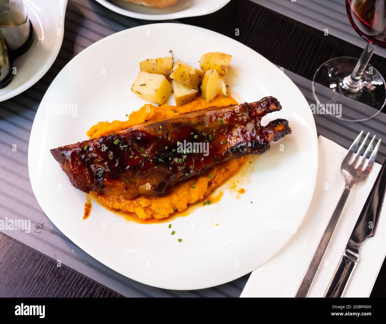 Pork ribs with BBQ sauce and sweet potato Stock Photo