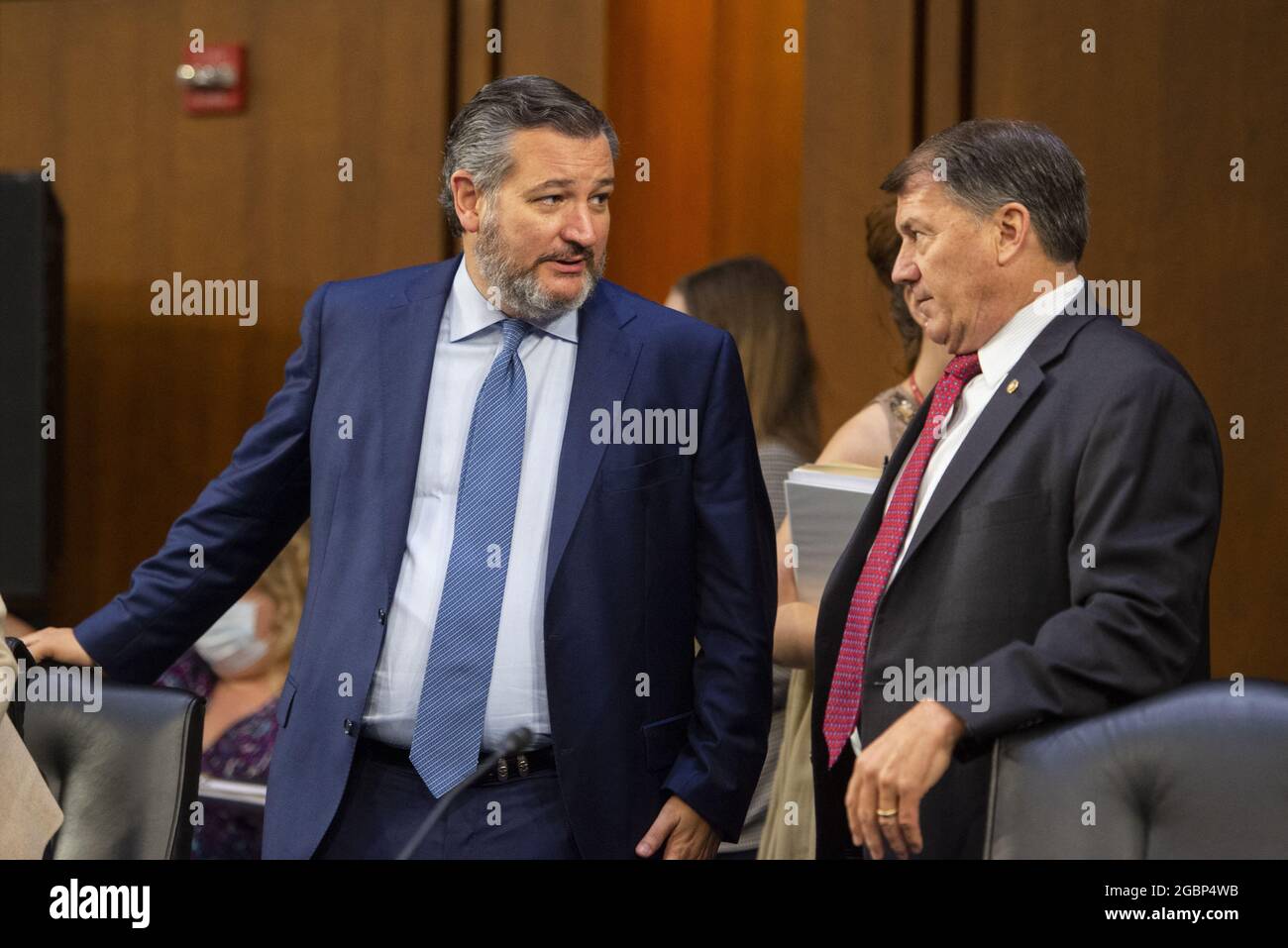 United States Senator Ted Cruz (Republican of Texas), left, confers with United States Senator Mike Rounds (Republican of South Dakota), right, during a Senate Committee on Foreign Relations business meeting for nominations and legislative considerations in the Hart Senate Office Building in Washington, DC, USA, Wednesday, August 4, 2021. Photo by Rod Lamkey/CNP/ABACAPRESS.COM Stock Photo