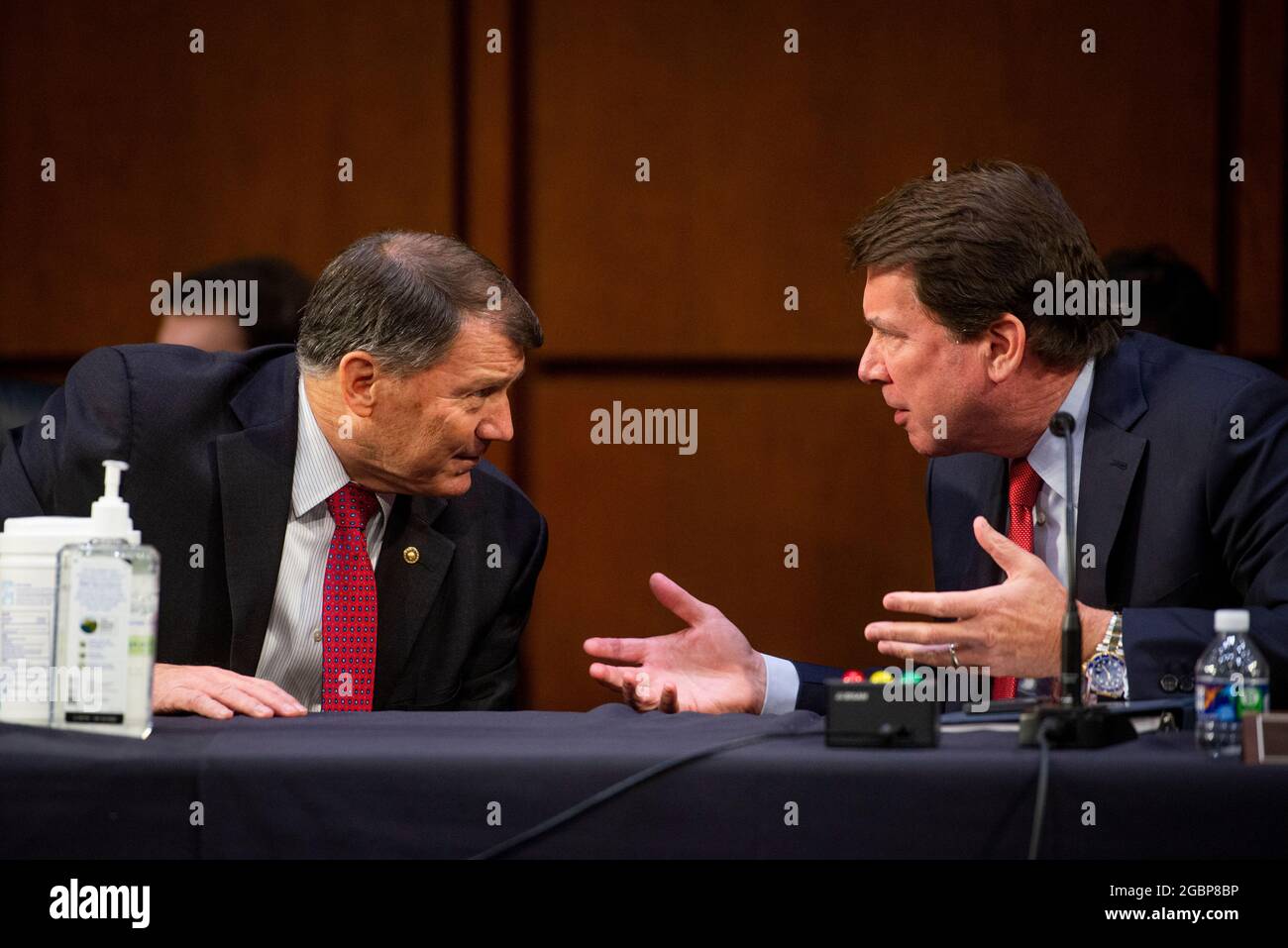 Washington, United States Of America. 04th Aug, 2021. United States Senator Mike Rounds (Republican of South Dakota), left, confers with United States Senator Bill Hagerty (Republican of Tennessee), right, during a Senate Committee on Foreign Relations business meeting for nominations and legislative considerations in the Hart Senate Office Building in Washington, DC, Wednesday, August 4, 2021. Credit: Rod Lamkey/CNP/Sipa USA Credit: Sipa USA/Alamy Live News Stock Photo