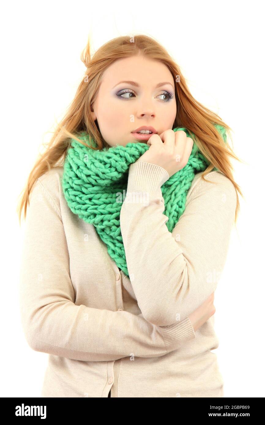Young beautiful woman wearing winter clothing on cold wind, isolated on