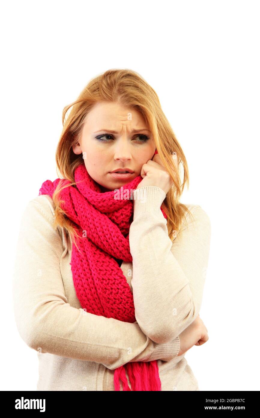 Young beautiful woman wearing winter clothing on cold wind, isolated on