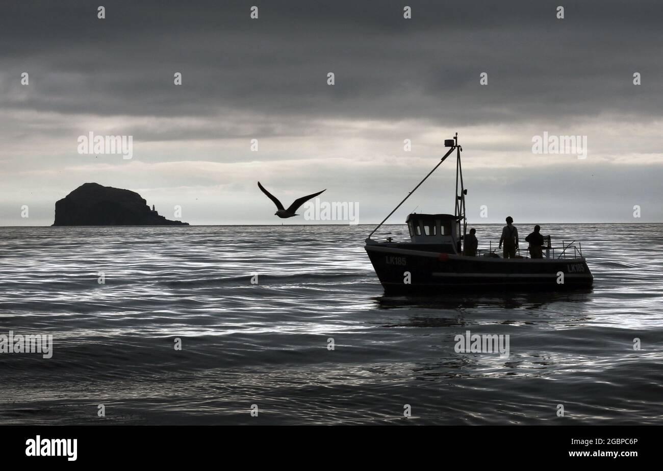 File photo dated 03/06/14 of a Scottish inshore fishermen at work off the east coast of Scotland, near Bass rock. The ocean conservation group Oceana is calling on the Scottish Government to ban bottom-towed fishing gear in the country's marine protected areas (MPAs). Issue date: Thursday August 5, 2021. Stock Photo