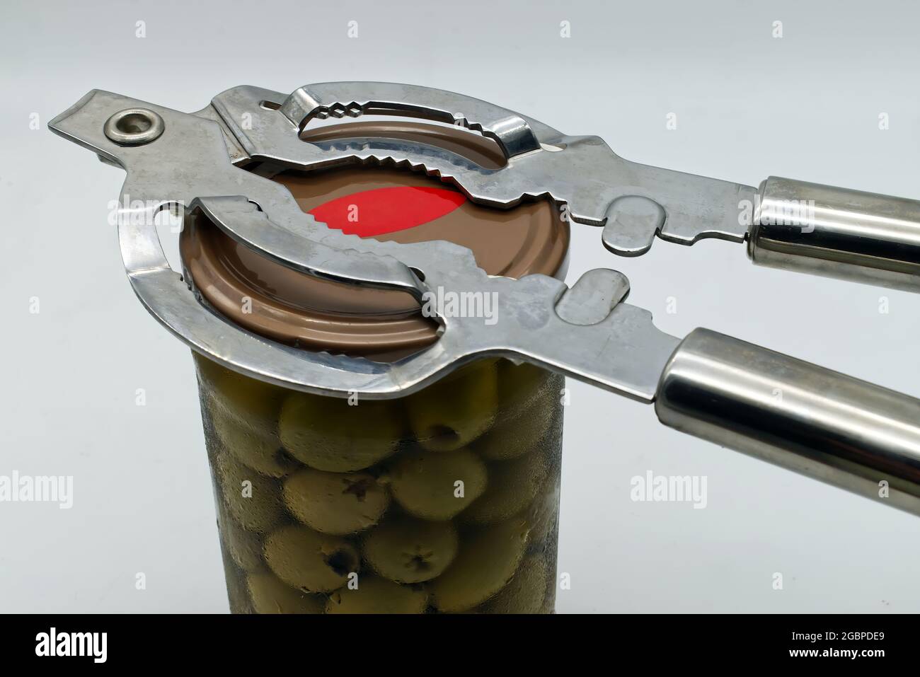 https://c8.alamy.com/comp/2GBPDE9/metal-jar-opener-isolated-on-white-background-2GBPDE9.jpg