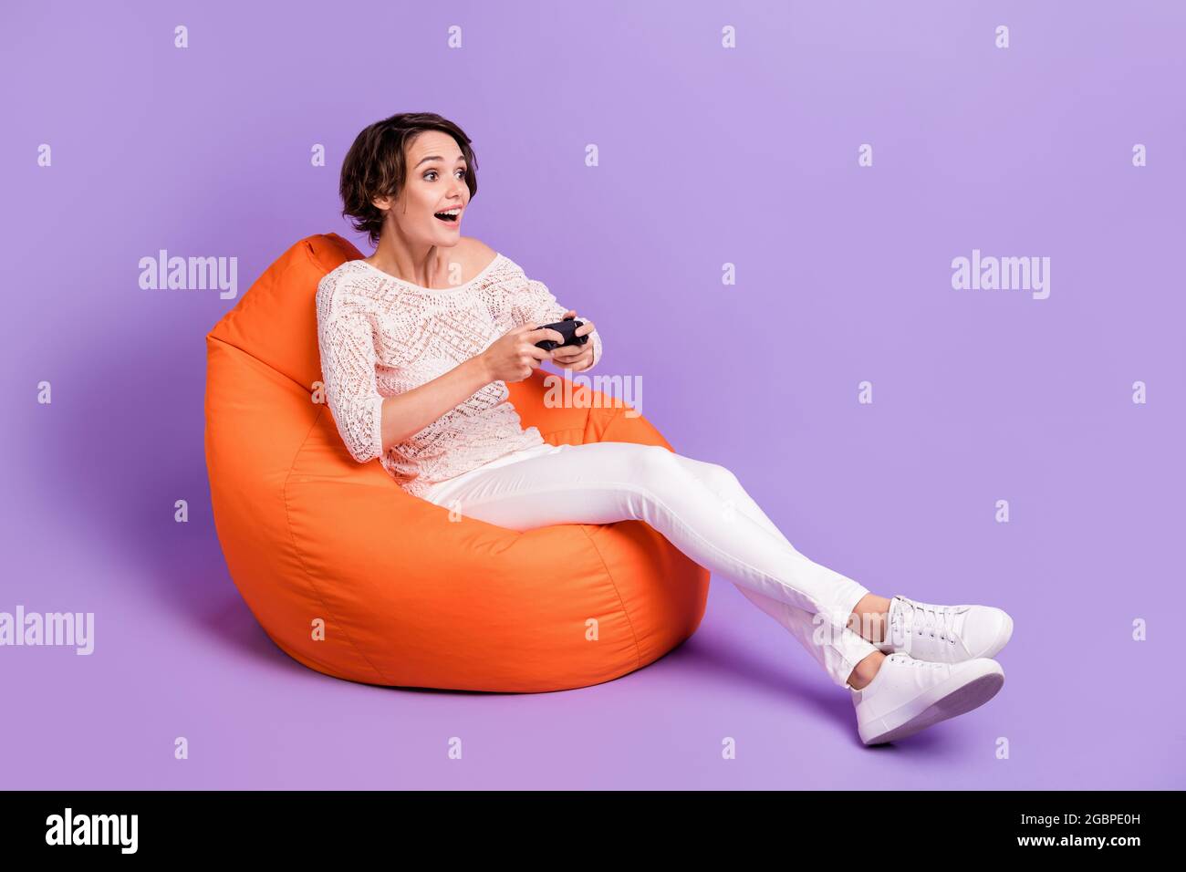 Full size profile photo of excited person sitting soft chair look empty