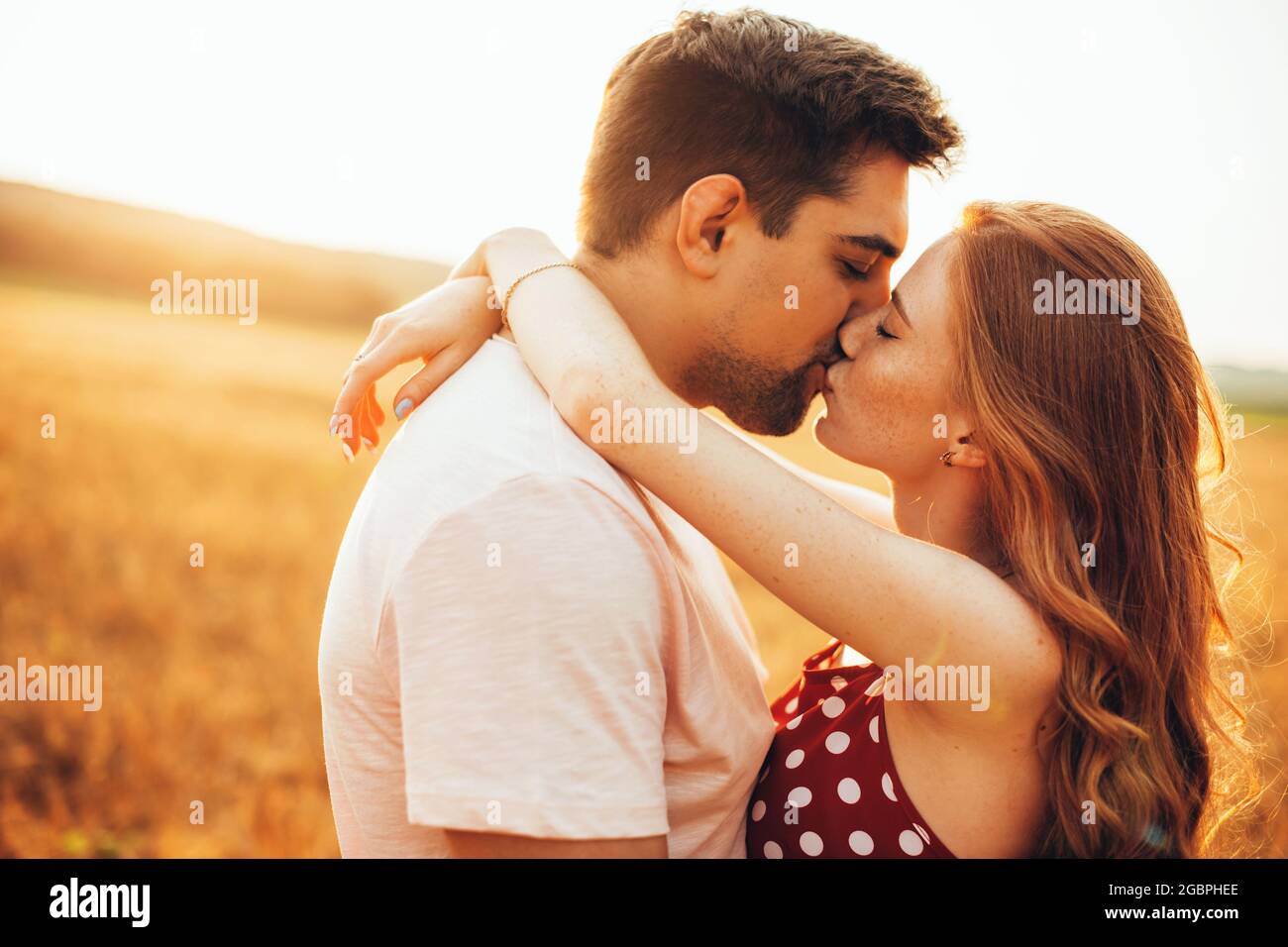 Lover kiss in park hi-res stock photography and images - Alamy