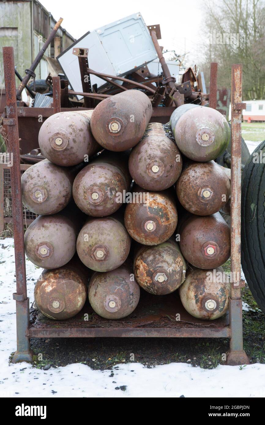 Here are a number of empty gas cylinders stored incorrectly and