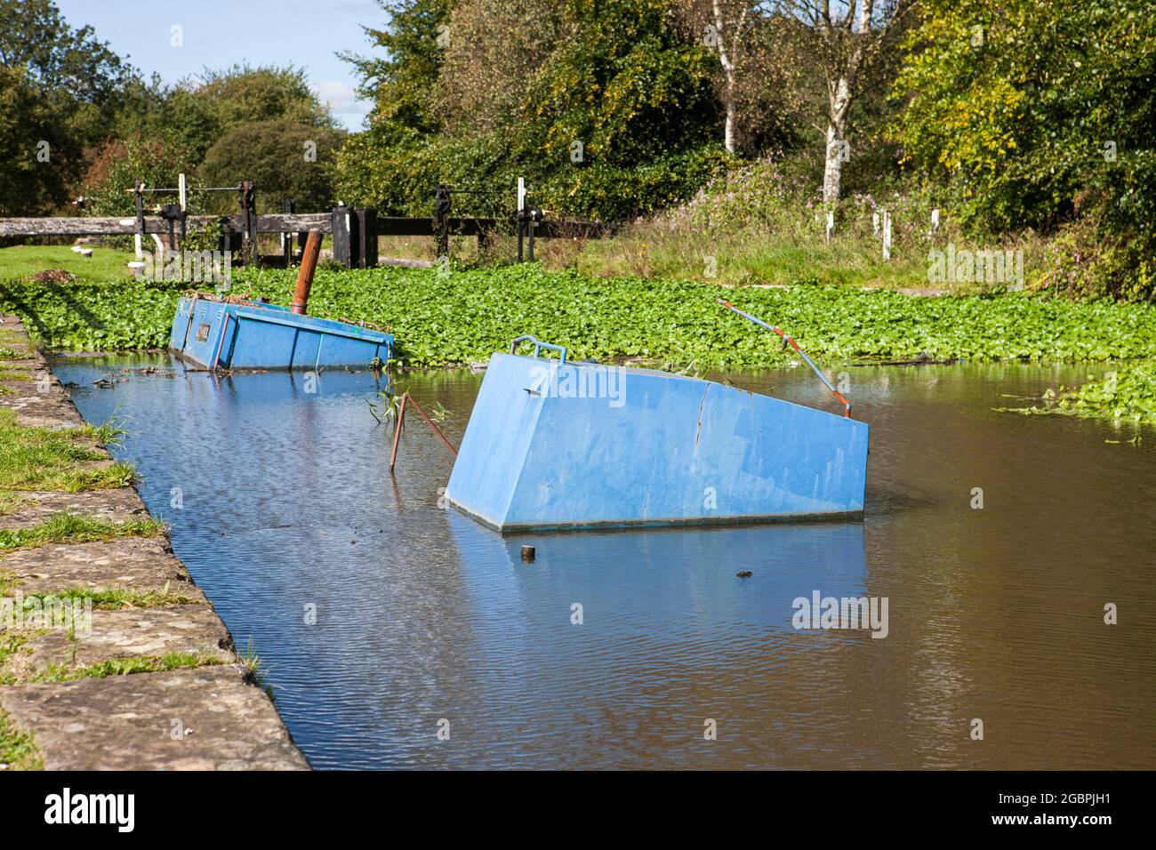 This shipwreck or otherwise boatwreck sank during the winter at Parbold Locks on the Leeds to Liverpool Canal whilst moored. It is now potentially an Stock Photo