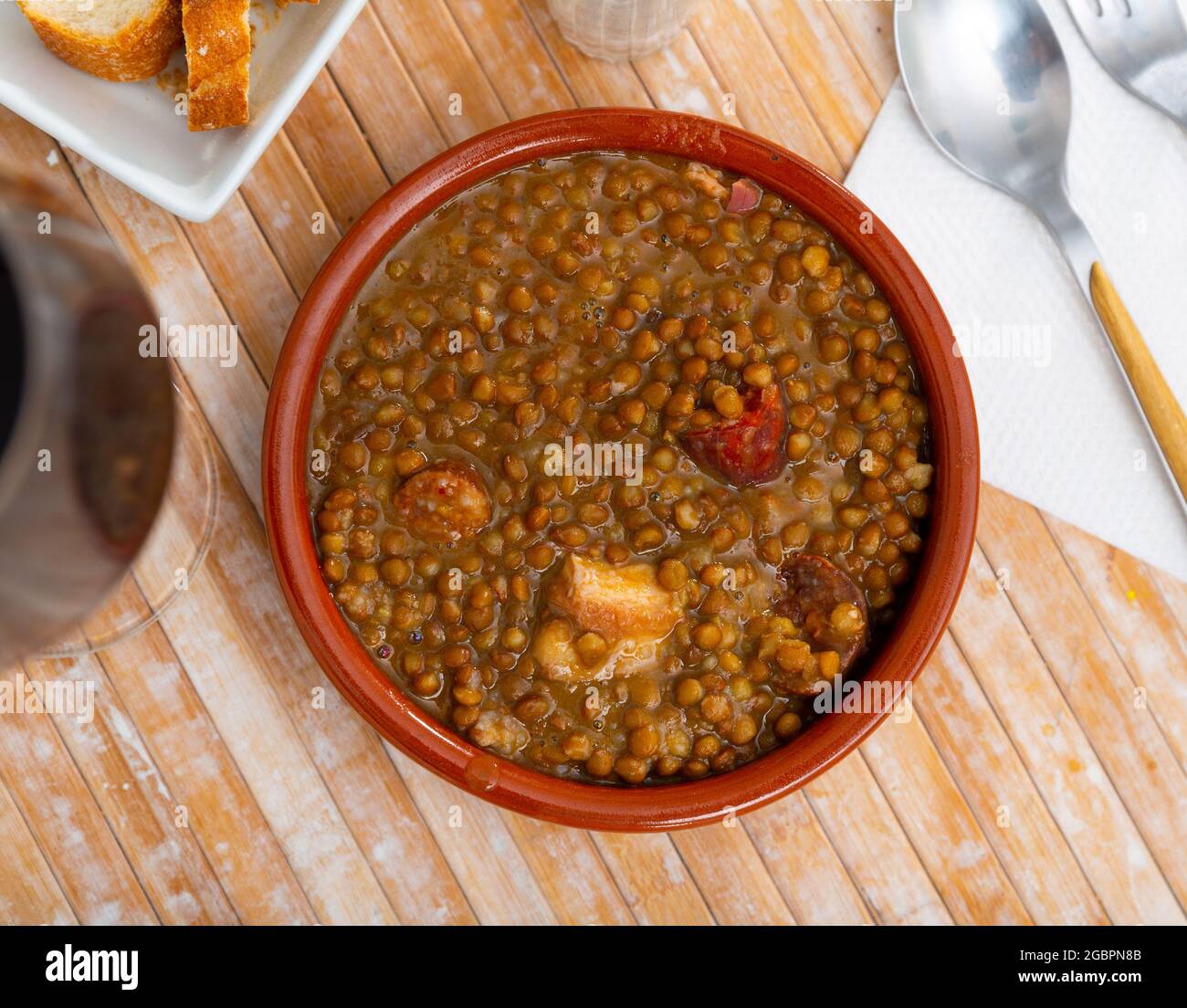 Stewed lentils with sausages, spanish Riojan lentils Stock Photo