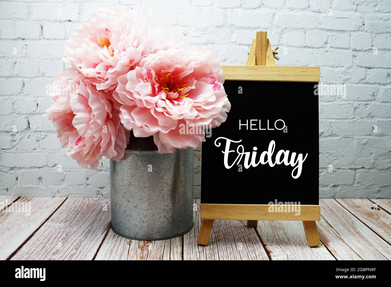 Hello Friday typography text on easel wooden board Stock Photo Alamy