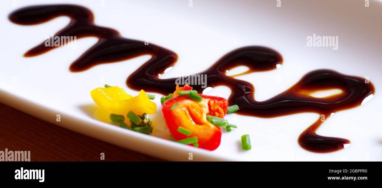 Delicious peppers with balsamico Stock Photo - Alamy