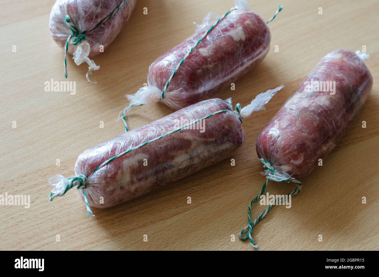 Stringy Ham Cut Step by step preparation of homemade chopped ham. Step 13: Four rolls ...