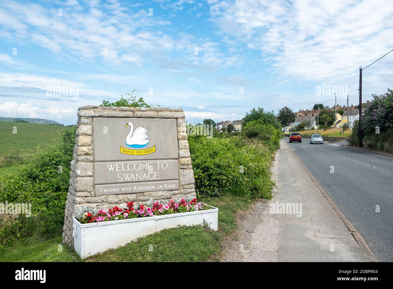 Dorset- UK: Welcome to Swanage sign on road leading to sea side town in south England Stock Photo