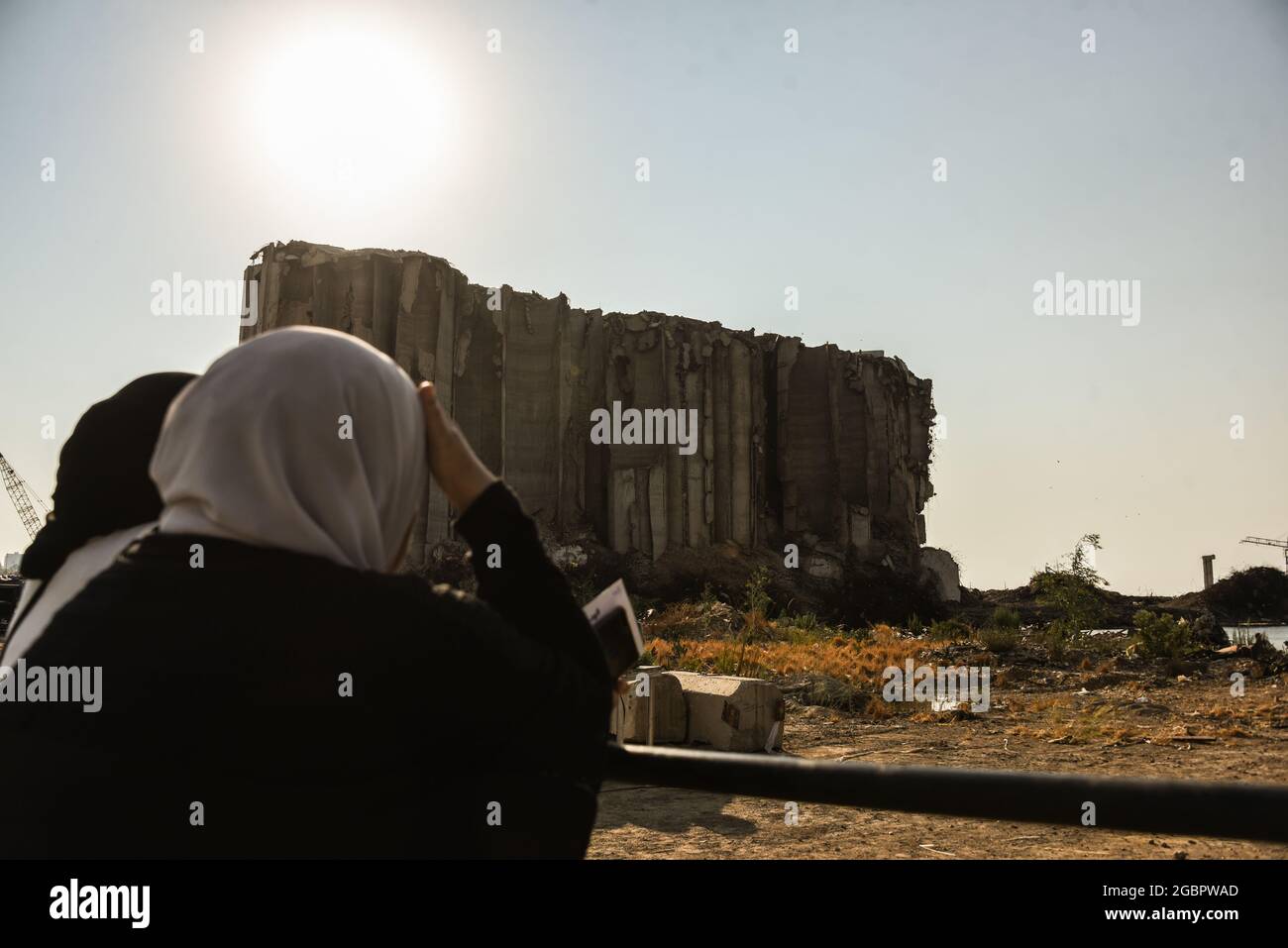 Beirut, Lebanon, 4 August 2021. Relatives of people killed in the Beirut Blast stand in front of