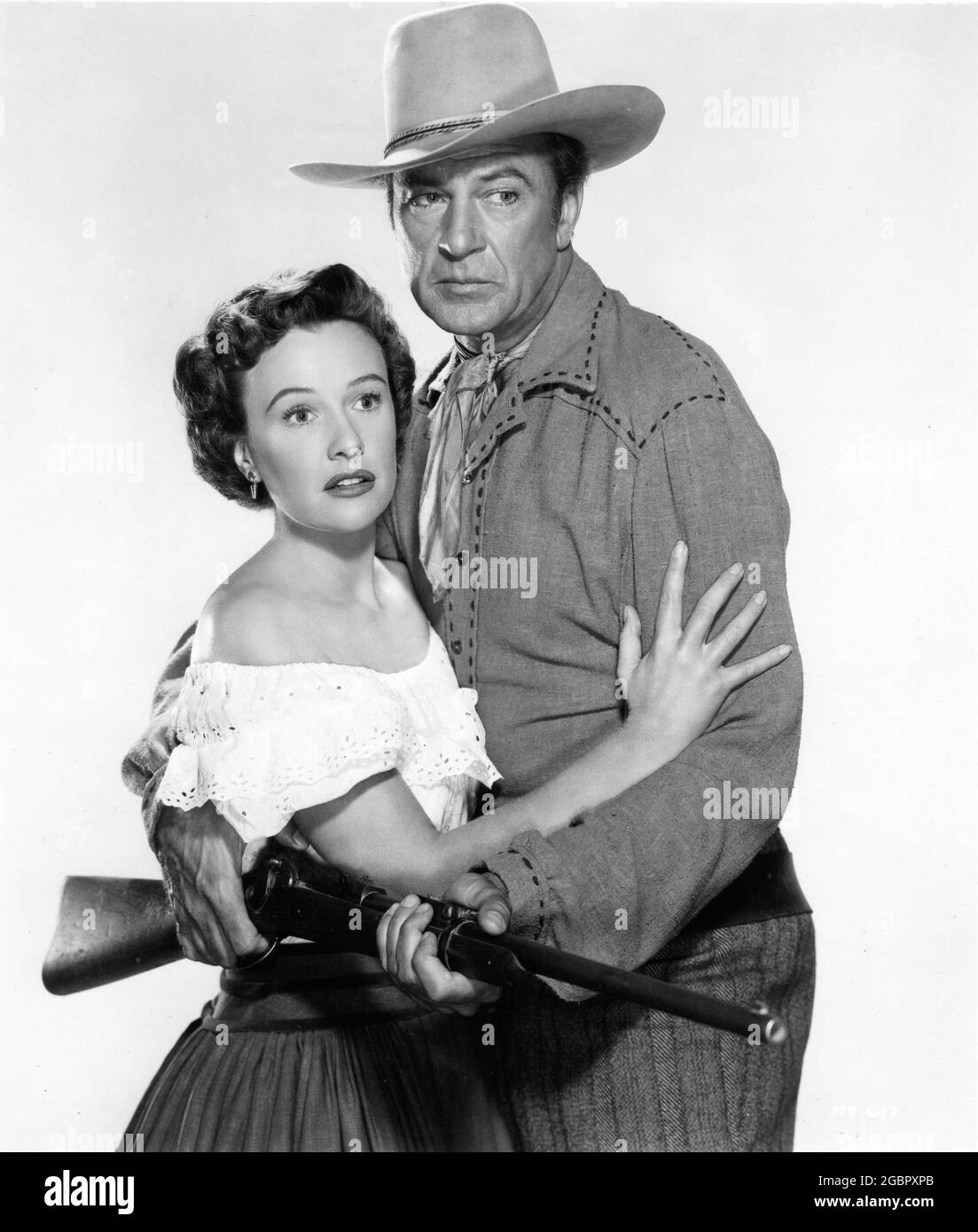 PHYLLIS THAXTER and GARY COOPER posed publicity portrait in SPRINGFIELD RIFLE 1952 director ANDRE DE TOTH music Max Steiner cinematography Edwin B. DuPar Warner Bros. Stock Photo