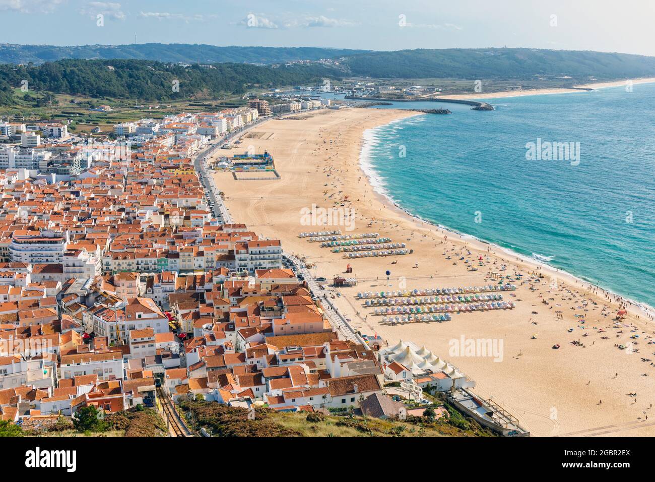 Nazare, Estremadura Province, Portugal.  The beach seen from Sitio, one of the three neighbourhoods of the town.  Sitio overlooks the main town from a Stock Photo