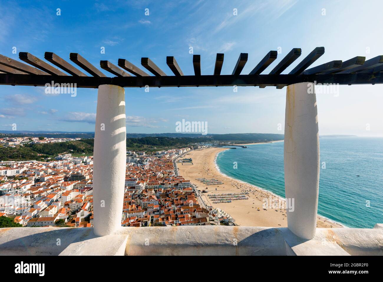 Nazare, Estremadura Province, Portugal.  The beach seen from Sitio, one of the three neighbourhoods of the town.  Sitio overlooks the main town from a Stock Photo